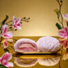Chef Wong's Flaky Teochew Salted Egg Lava Purple Sweet Potato mooncake, whole and halved showing purple sweet potato filling with molten salted egg centre