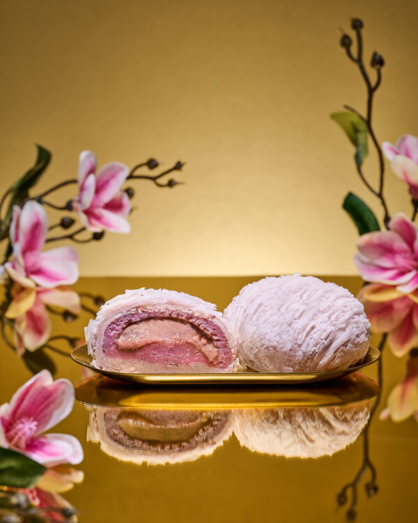 Chef Wong's Flaky Teochew Salted Egg Lava Purple Sweet Potato mooncake, whole and halved showing purple sweet potato filling with molten salted egg centre