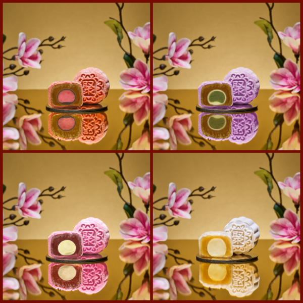 Four Mini Snowskin mooncakes by JU Signatures, halved to show pink, green, cream and golden fillings, each stamped with the 聚 character
